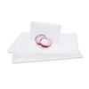 White Polyethylene Cutting Board With Sliced Radishes On A Kitchen Prep Surface