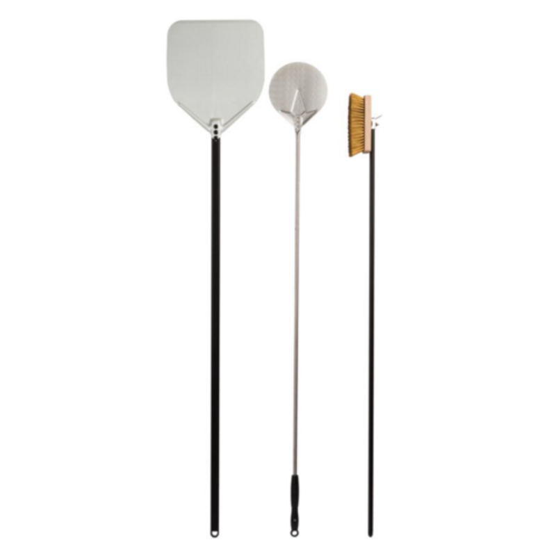 Multi-Fuel Oven For Versatile Cooking Utensils Including Pizza Peel, Mesh Tool, And Cleaning Brush.