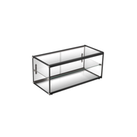 Non-Refrigerated Countertop Display Case Showcasing Delicious Pastries And Treats In A Sleek Glass Design.