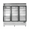 Three Door Glass Freezer Merchandiser With Transparent Doors And Shelves For Product Display.
