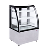 Curved Glass Refrigerated Display Case With Shelves For Showcasing Food Merchandise In A Retail Setting