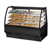 Curved Glass Bakery Display Case Filled With Assorted Pastries, Desserts, And Baked Goods
