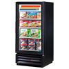 True Manufacturing 24.88 Inch Swing Glass Door Merchandising Freezer Displaying Frozen Foods and Ice Cream.