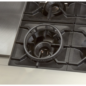 Cast Iron Wok Ring For Commercial Ranges Positioned On A Heavy-Duty Range Grate