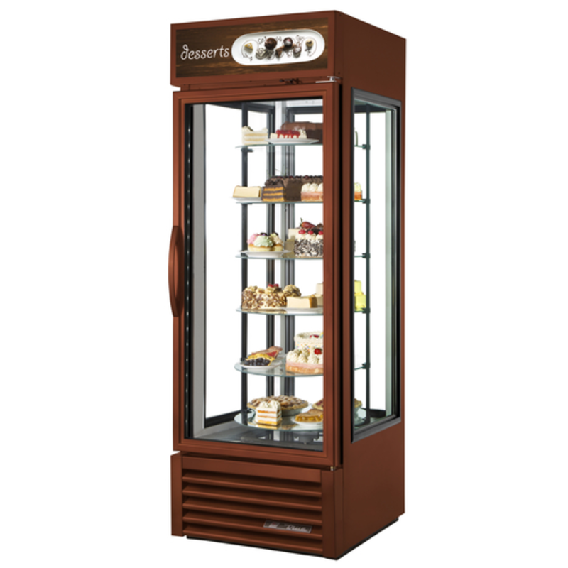 Four Sided Glass Merchandiser Refrigerator Showcasing Desserts In A Sleek Design With Bright LED Lighting.