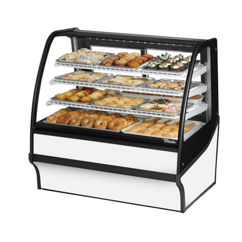 Curved Glass Bakery Display Case Featuring Assorted Pastries And Desserts In A Beautifully Arranged Showcase.