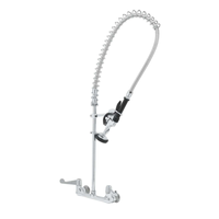 EFI Wall Mount Pre Rinse Faucet Featuring A Chrome Plated Design And Flexible Spray Hose For Efficient Dishwashing.
