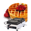 Krampouz WECDCAAS 7.3-inch Round Commercial Single Electric Waffle Maker making golden round waffle with strawberries and syrup