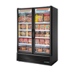 True Manufacturing 54" Two-Door Glass Swing Freezer Merchandiser With Various Frozen Products Displayed Inside.