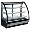 Curved Glass Refrigerated Showcase With Transparent Shelves For Displaying Desserts And Pastries.