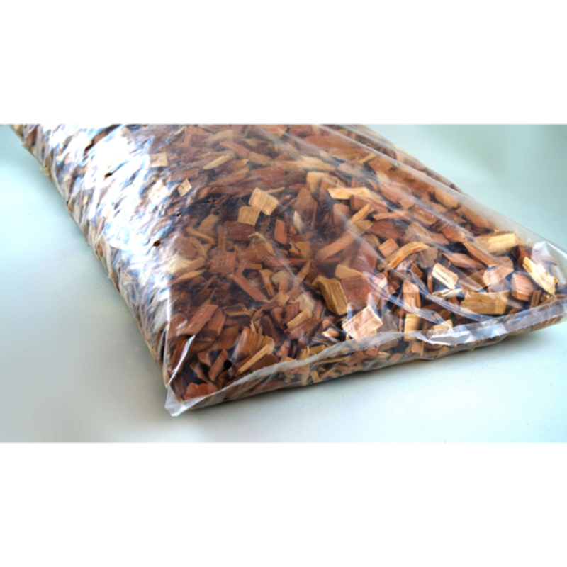 Maple Smoking Wood Chips Packed In A Clear Bag, Ideal For Infusing Flavor In Grilling And Smoking.