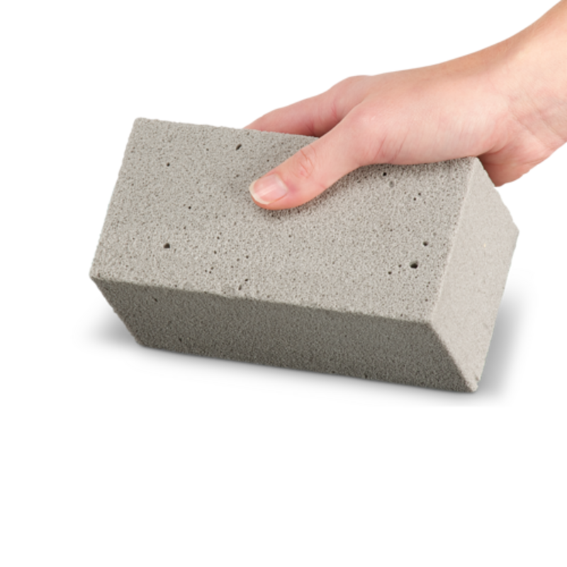 Hand Holding A Gray Brema Cube Ice Maker Ice Block For Easy Handling And Storage