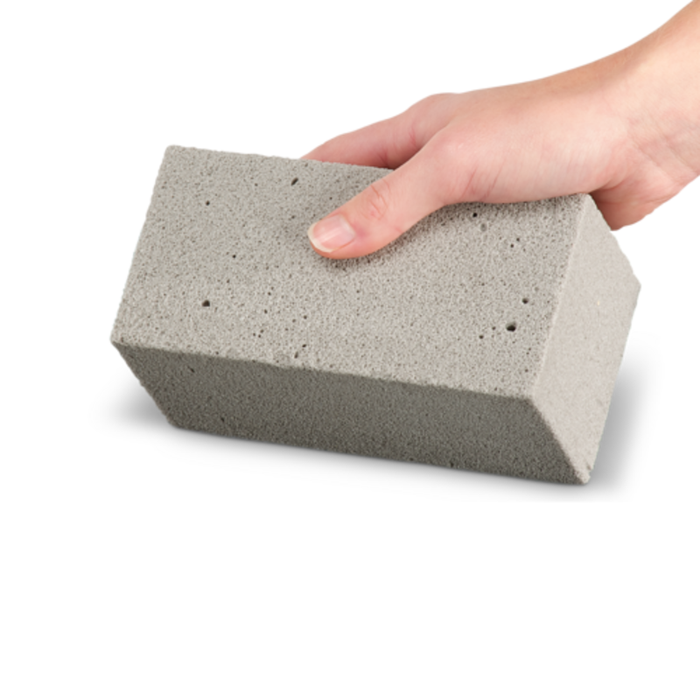 Hand Holding A Gray Brema Cube Ice Maker Ice Block For Easy Handling And Storage