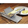 Alt Tag: Omcan 43033 Aluminum Manual Cheese Cutter with Interchangeable Bows slicing semi-soft cheese into cubes on countertop
