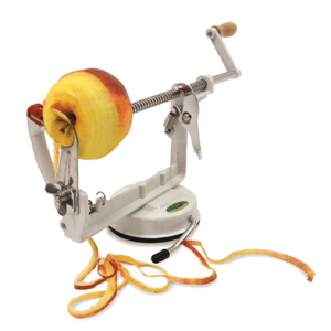 Omcan 10829 Efficient Manual Tabletop Apple Corer Peeler Slicer Kitchen Tool peeling and slicing an apple with hand crank