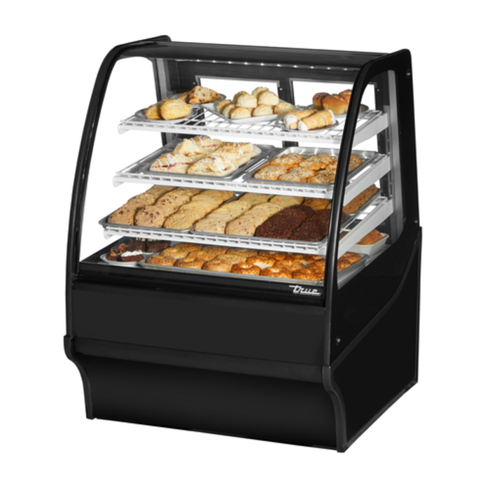 Alt Tag: True 36 Inch Curved Glass Non-Refrigerated Dry Bakery Display Case with curved glass front, multi-tier shelves, assorted pastries