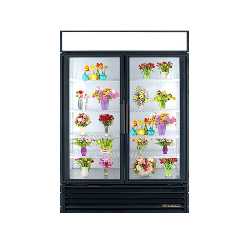 True GDM-49 refurbished floral glass door merchandiser refrigerator with two glass doors displaying fresh flower arrangements