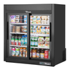 True Manufacturing 36" Wide Countertop Glass Door Refrigerator Merchandiser Filled With Cold Beverages And Packaged Foods