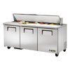 True 72 Inch Three Door Refrigerated Sandwich Prep Table With Fresh Vegetables And Ingredients Ready For Use