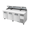 True 93-Inch Refrigerated Pizza Prep Table Featuring Three Solid Doors For Efficient Kitchen Preparation.