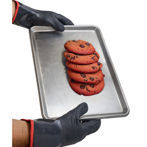 Omcan 47259 13-Inch Heat Resistant Gloves, 500°F Professional Kitchen Hand Protection holding hot baking tray with cookies