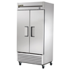 True T-Series Bottom Mount Freezer In A Commercial Kitchen Setting With Double Doors And Temperature Control.
